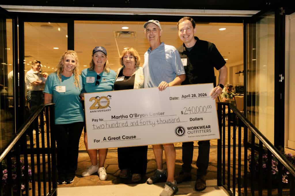 Workwear Outfitters presents check to MOBC